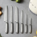 7-Piece Stainless Steel Knives Kitchen Set with Block - Retro 50S Aesthetic Countertop Set, 67-Layer Construction, Olive Design, Includes Chef, Bread, Santoku Knives, Multifunctional, Safe for Home Kitchen Use