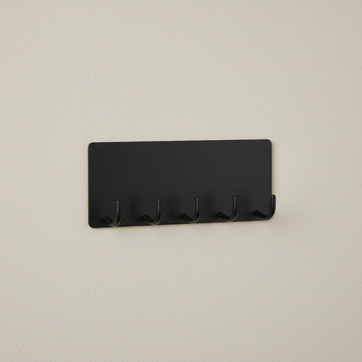 Black wall-mounted metal key holder with five hooks