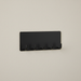 Black wall-mounted metal key holder with five hooks