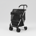 Black foldable pet stroller with mesh cabin, storage basket, and four wheels